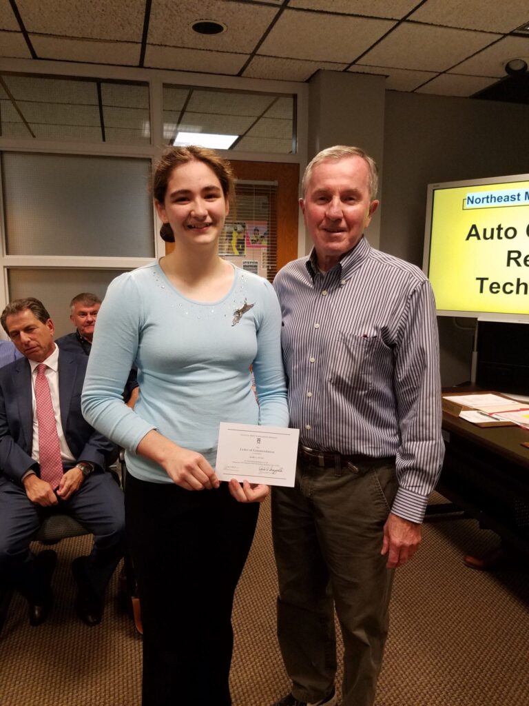 Northeast Metro Tech Senior Mary Fung, the school's first National Merit Scholarship Program Commended Student, with Stoneham School Committee member Larry Means. (Courtesy Photo Northeast Metro Tech).