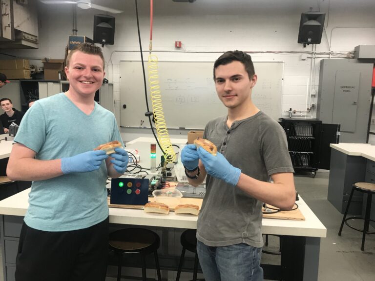 *Video* Northeast Students Build Automated Device to Cook Hot Dogs Using Electricity 