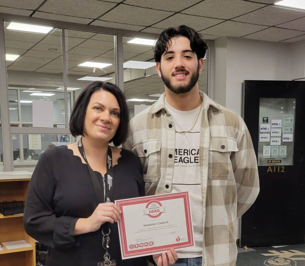 Northeast Dental Assisting teacher Erin Selvitella and Senior Sebastian Cadavid, of Saugus, who was recognized for performing CPR in the community. (Courtesy Photo Northeast Metro Tech)